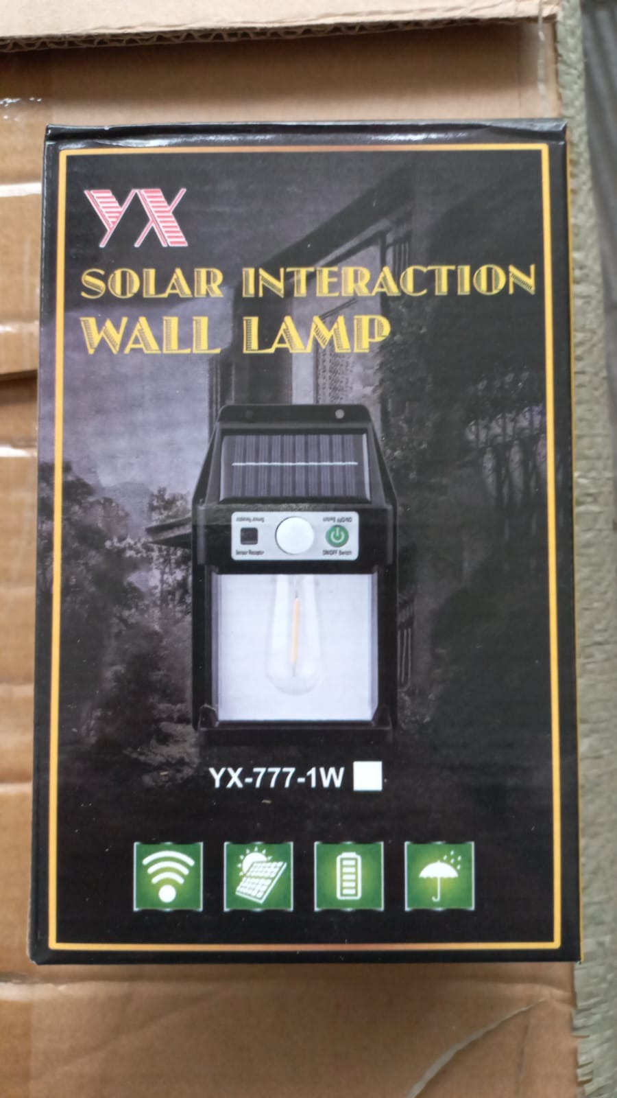 Lámpara de pared para exteriores con carga solar